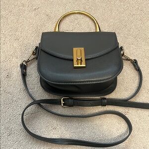 Love and Lore by Indigo Elegant Black Crossbody Bag with Gold Accents